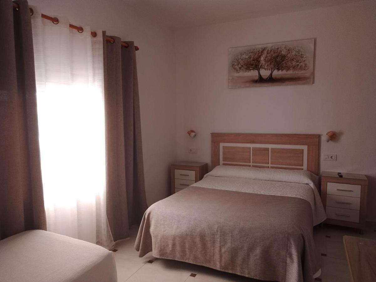 Готель Hostal Los Arcos Чипіона Екстер'єр фото